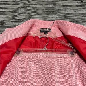 Sag Harbor Pink and Red Women's Blazer with its skirt.  Five buttons on front b